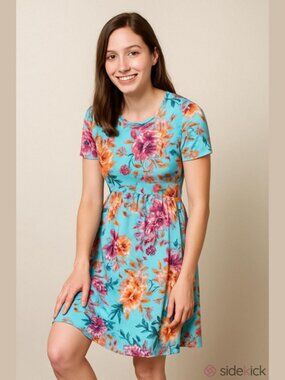 Chris&Carol dress, size small ,made in U.S.A. Floral .Two side pockets.